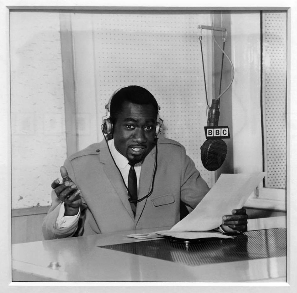 James Barnor (Ghanaian based in London, b. 1929) 'Mike Eghan at the BBC Studios, London' 1967, printed 2010 (installation view) from the display 'Stan Firm inna Inglan' at Tate Britain, London, November 2017
