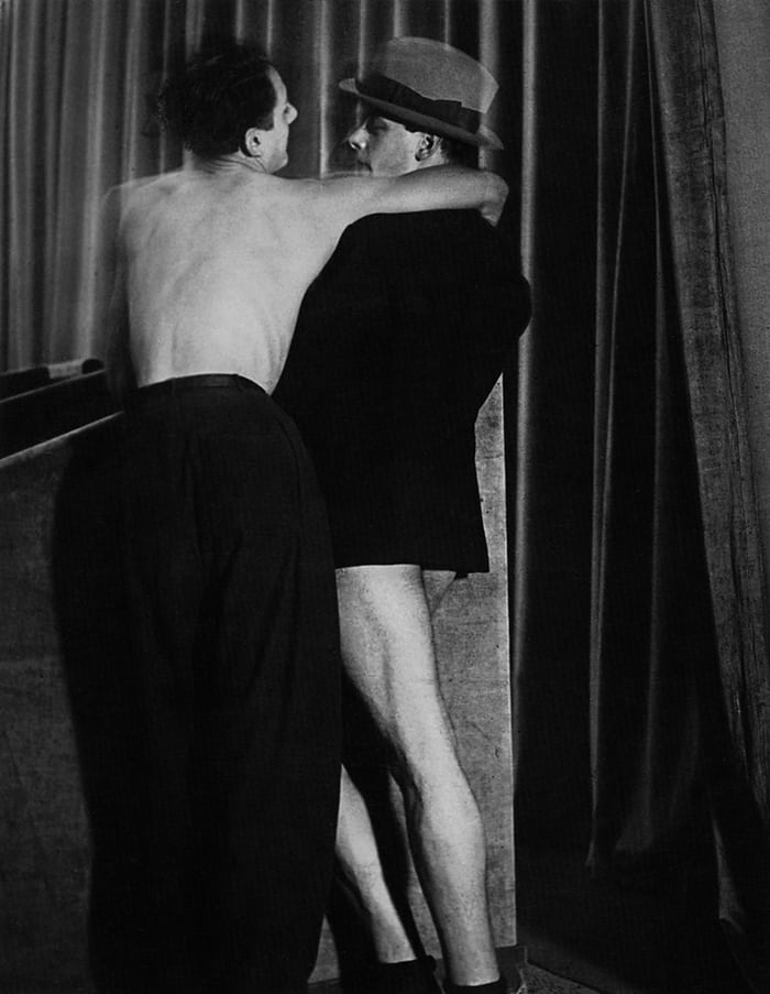Brassaï (French, 1899-1984) 'Young couple wearing a two-in-one suit at Bal De La Montagne Saint-Genevieve' 1931