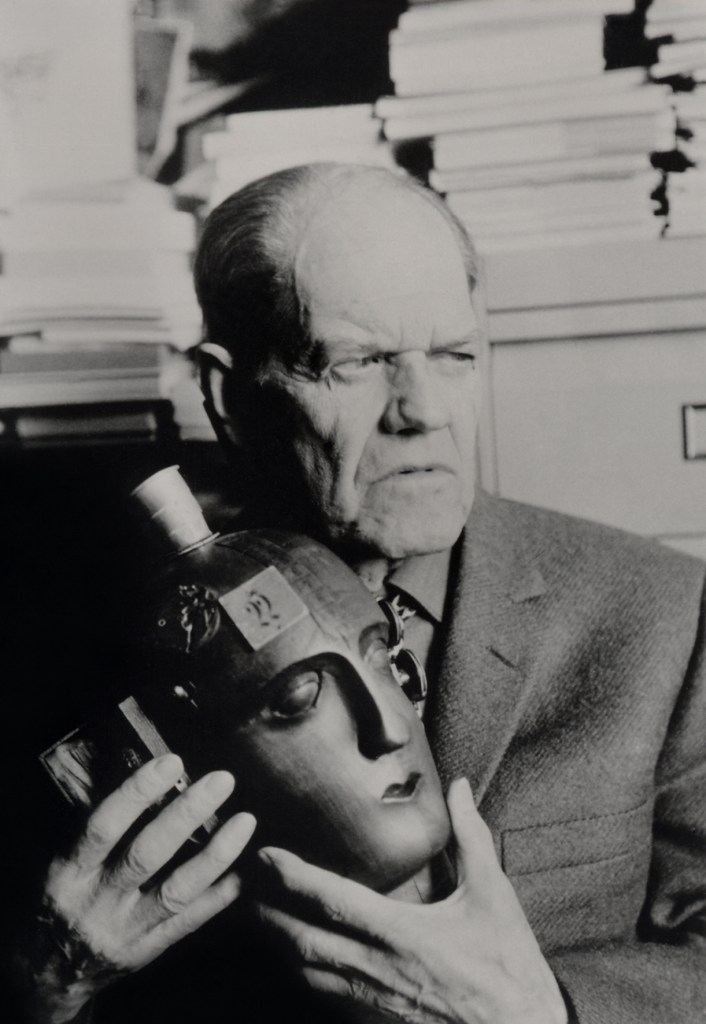 Marthe Prévôt (b. 1923) 'Raoul Hausmann tenant sa sculpture-assemblage L'Esprit de notre temps' (Raoul Hausmann holding his sculpture-assembly The Spirit of our time) 1967 Marthe Prévôt (b. 1923) 'Raoul Hausmann tenant sa sculpture-assemblage L'Esprit de notre temps' (Raoul Hausmann holding his sculpture-assembly The Spirit of our time) 1967