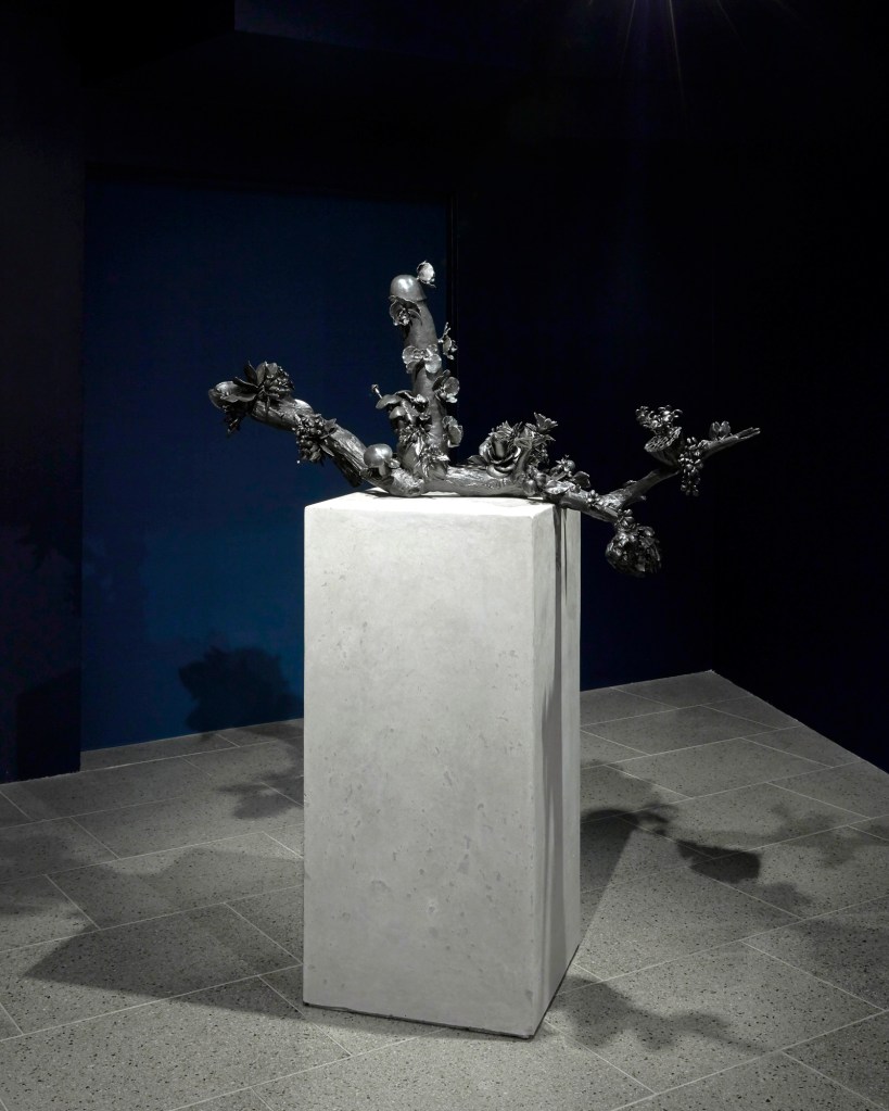 Installation view of 'Del Kathryn Barton: The Highway is a Disco' at the Ian Potter Centre: NGV Australia featuring the bronze 'i can grow you more, drunk on its own nectar' (2017)