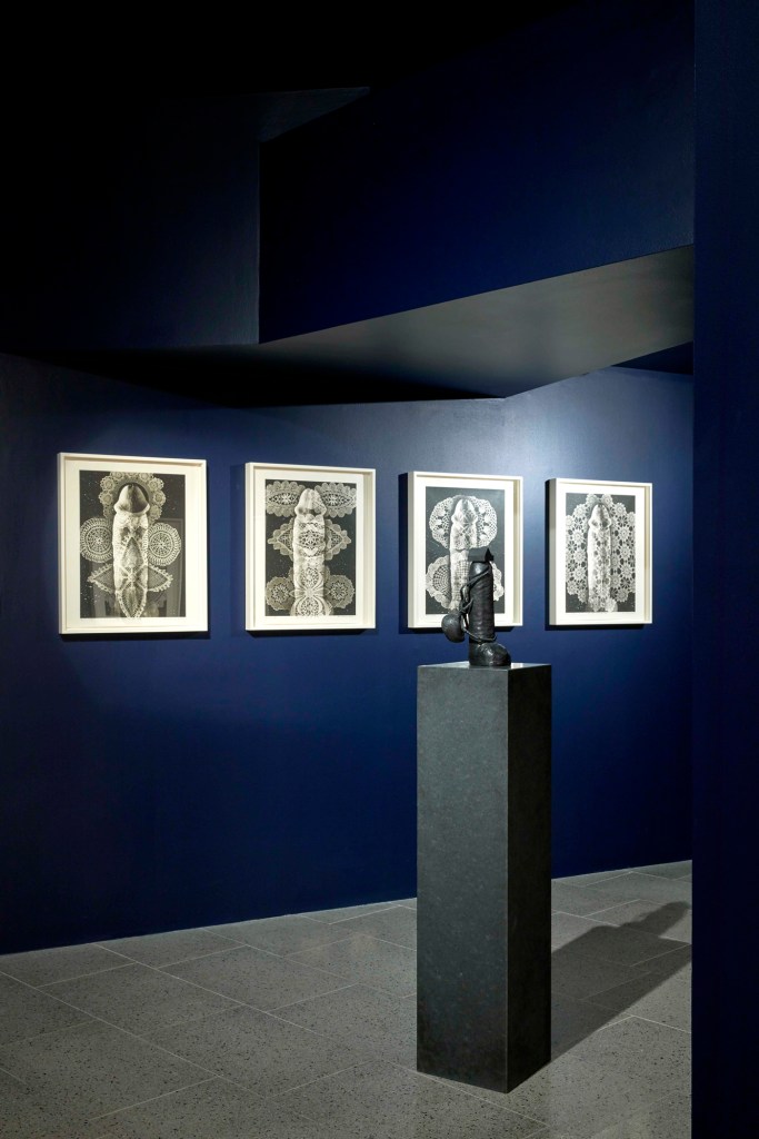 Installation view of 'Del Kathryn Barton: The Highway is a Disco' at the Ian Potter Centre: NGV Australia featuring the photogravure work 'the stars eat your body' (2009) and the bronze 'up in this' (2012)