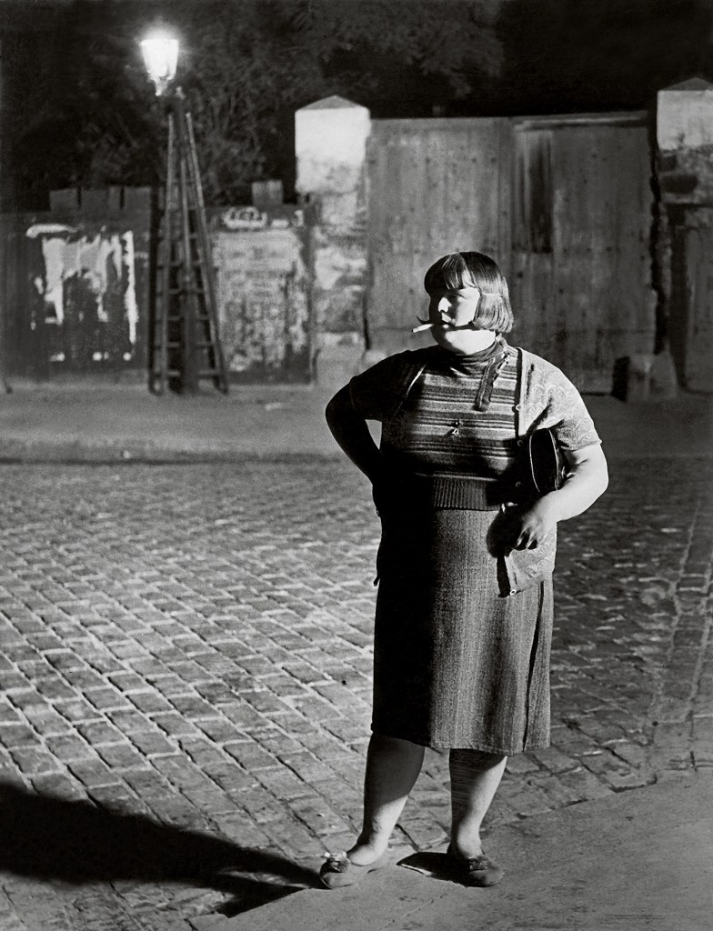 Brassaï (Gyulá Halász) (Hungarian-French, 1899-1984) 'Streetwalker, near the place d’Italie' 1932