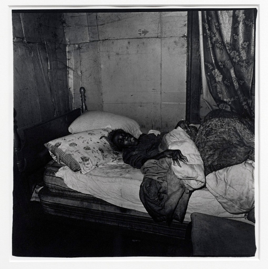 Diane Arbus (American, 1923-1971) 'Old black woman with gnarled hand' 1968 (installation view)