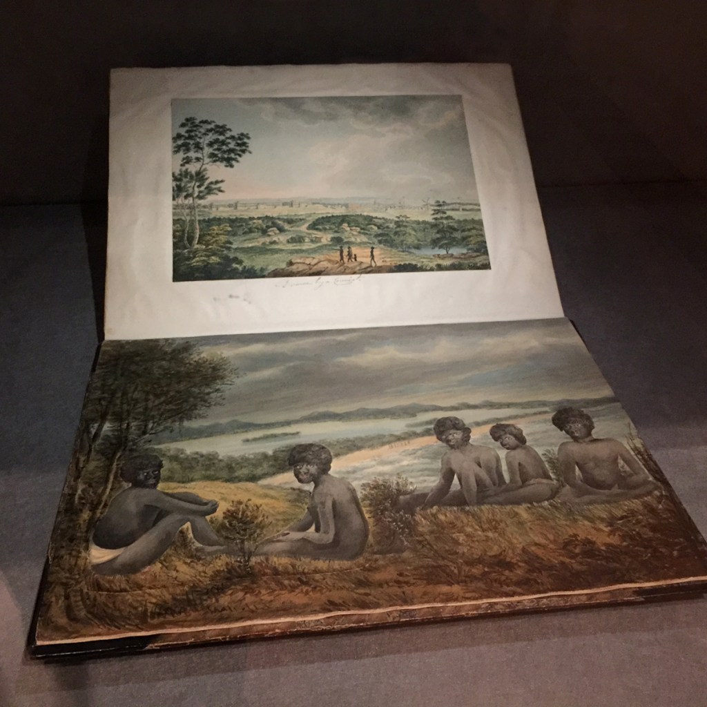James Wallis (Ireland c. 1785 - England 1858, Australia 1814-19) 'View of Awabakal Aboriginal people, with beach and river inlet, and distant Aboriginal group in background' c. 1818 (installation view)