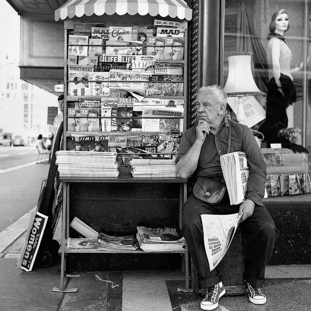 John Williams (Australian, 1933-2016) 'Paper Seller, Farmer’s Building, Sydney' 1965 from the exhibition 'My last 60 years on the streets: John Williams Retrospective (1933 - 2016)' at Magnet Galleries, Melbourne, June - July, 2018
