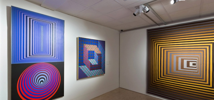 Installation view of the exhibition Victor Vasarely. The Birth of Op Art at the Museo Nacional Thyssen-Bornemisza, Madrid showing from left, 'Doupla', 1970-1975; 'Kotzka', 1973-1976 and 'Vonal-Fegn', 1968-1971