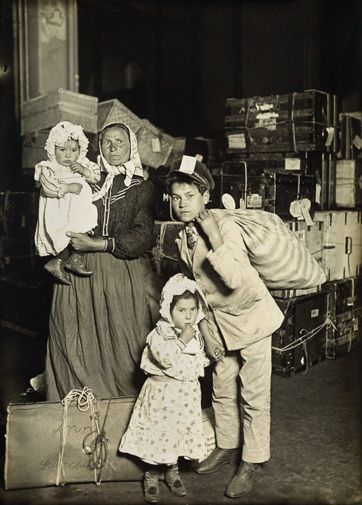 Lewis Hine (American, 1874-1940) 'Italian family in the baggage room' 1905