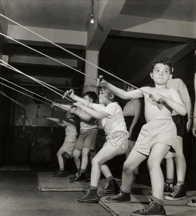 Roman Vishniac (1897-1990) 'Boys exercising in the gymnasium of the Jewish Community House of Bensonhurst, Brooklyn' 1949