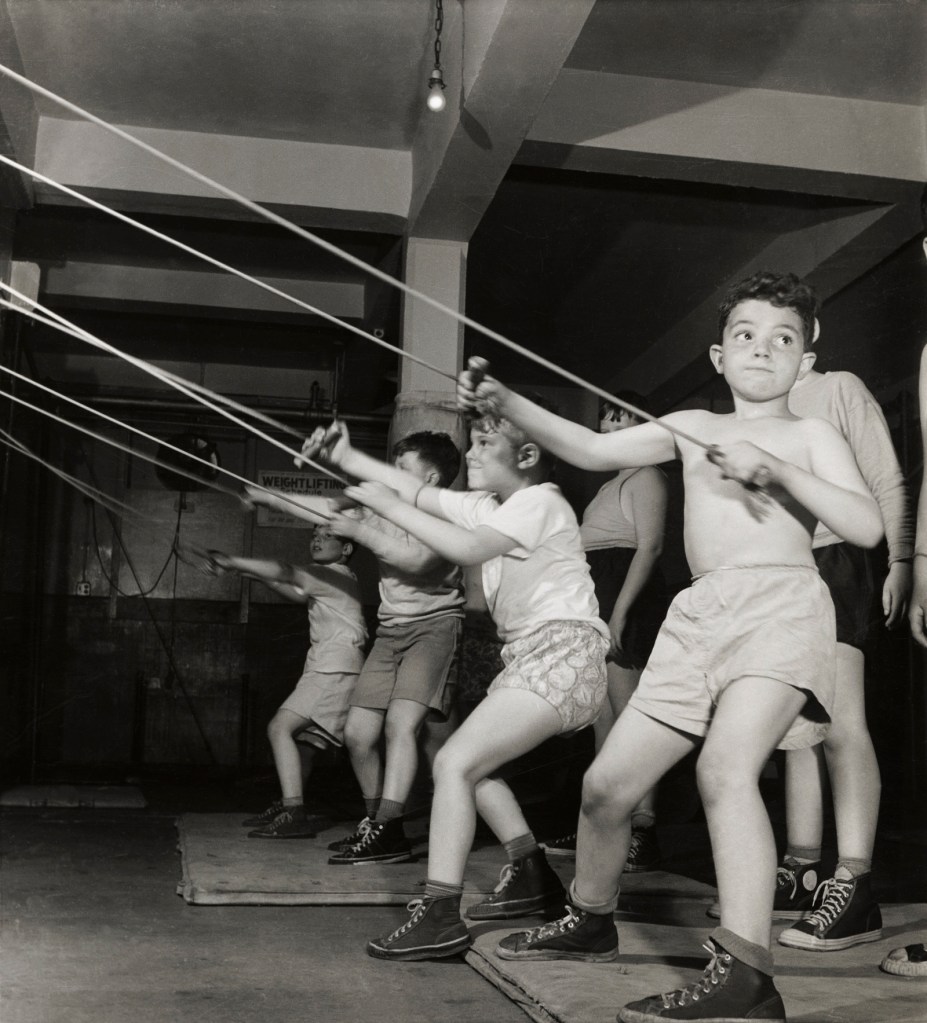 Roman Vishniac (America born Russia, 1897-1990) 'Boys exercising in the gymnasium of the Jewish Community House of Bensonhurst, Brooklyn' 1949