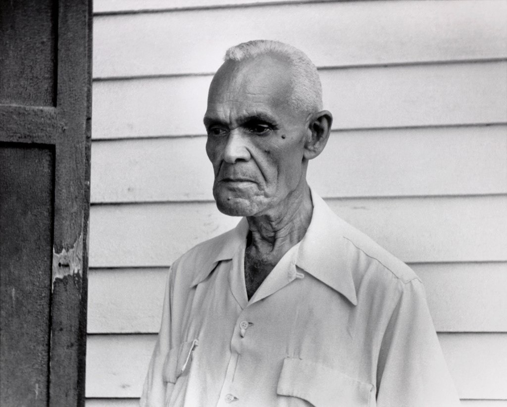Ralston Crawford (American, 1906-1978) 'John "Papa" Joseph, Outside Barbershop, New Orleans' 1958