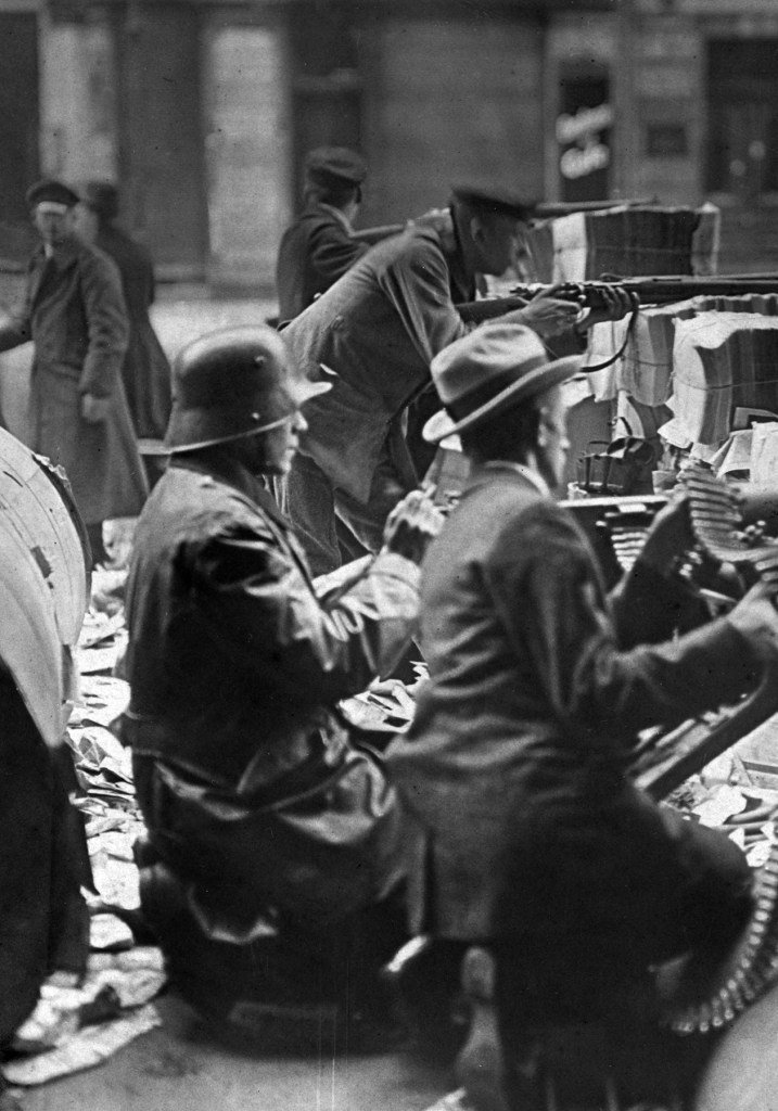 Willy Römer (German, 1887-1979) 'Machine-gun post behind barricades consisting of rolled newspaper in front of the Mosse building on Schützenstraße' 11.1.1919 (detail)