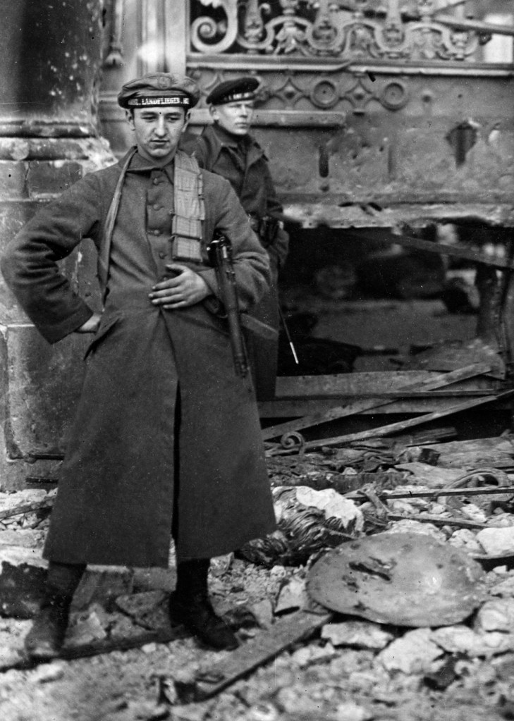 Willy Römer (German, 1887-1979) 'Street battles on Christmas Eve in Berlin. Naval ratings in front of the ruined Palace entrance after bombardment by artillery' 24.12.1918 (detail)