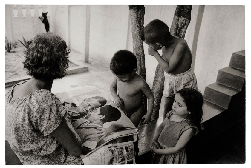 Henri Ballot (French / Brazilian, 1921-1997) 'Maria Penha da Silva, Flávio's Grandmother, and Her Other Grandchildren, Reading 'Life', Guadalupe, Rio de Janeiro, Brazil' 1961
