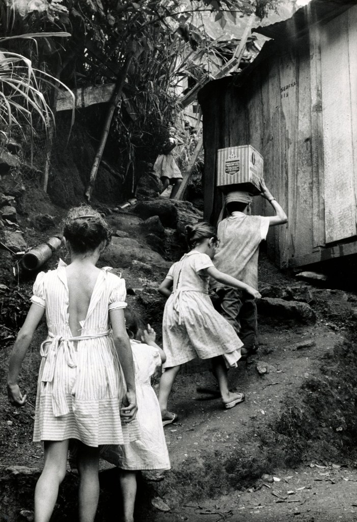 Gordon Parks (American, 1912-2006) 'Untitled (The da Silva Children Climbing the Hillside), Rio de Janeiro, Brazil' 1961