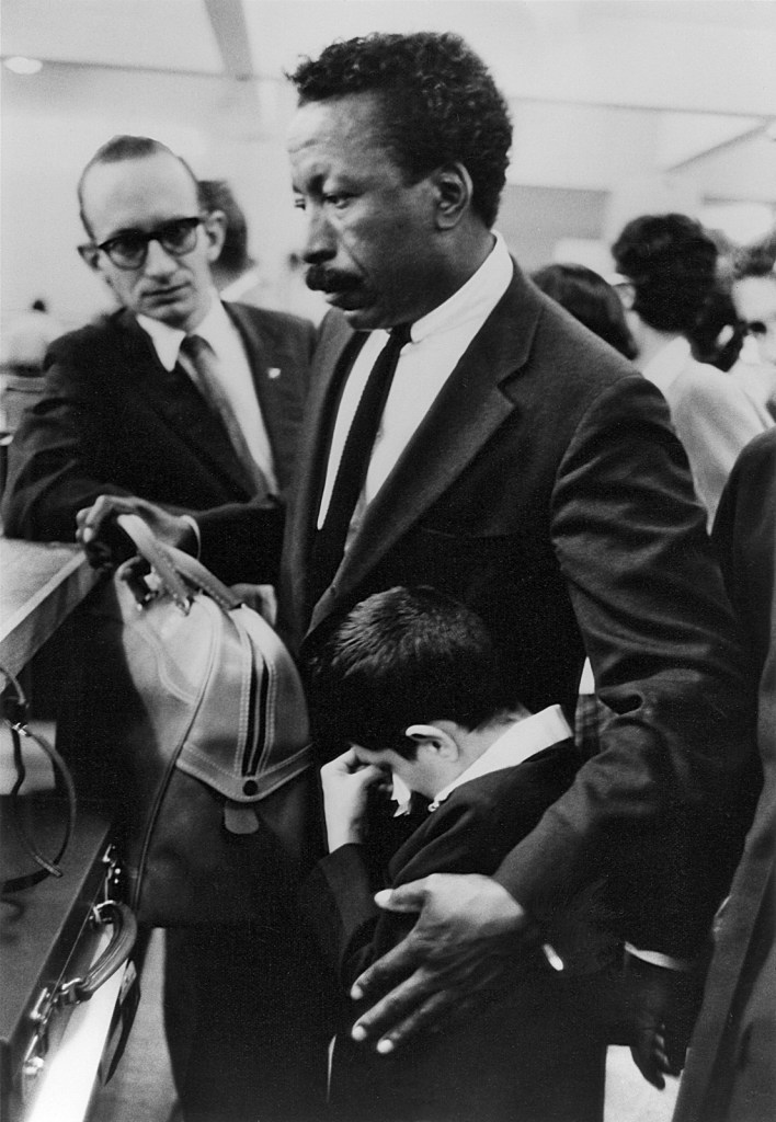 Paulo Muniz (Brazilian, 1918-1994) 'Untitled (Gordon Parks and Flávio da Silva at Airport, Soon to Fly to United States), Rio de Janeiro, Brazil' Negative July 5, 1961, printed later