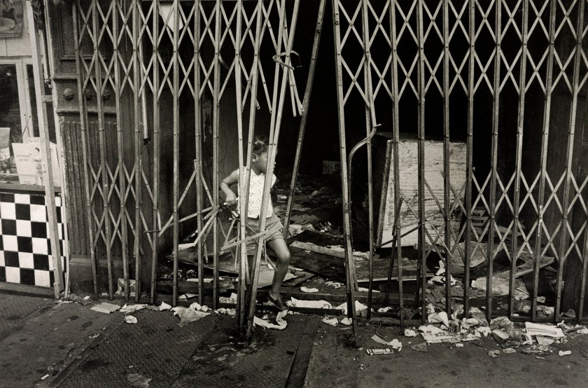 Henri Ballot (French / Brazilian, 1921-1997) 'Child Playing Surrounded by Trash, Manhattan, New York' 1961