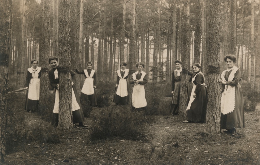 Photographer Unidentified. 'Untitled (women in aprons pose among trees)' 1913
