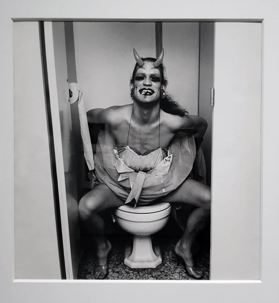 Peter Hujar (American, 1934-1987) 'Man in Costume on Toilet, Backstage at Palm Casino Review' 1974 (installation view)