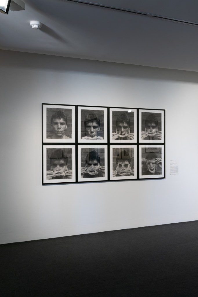 Installation view of the exhibition 'Dressing Up' at the Monash Gallery of Art, Melbourne showing Gordon Bennett's 'Self-portrait (Nuance II)' (1994)
