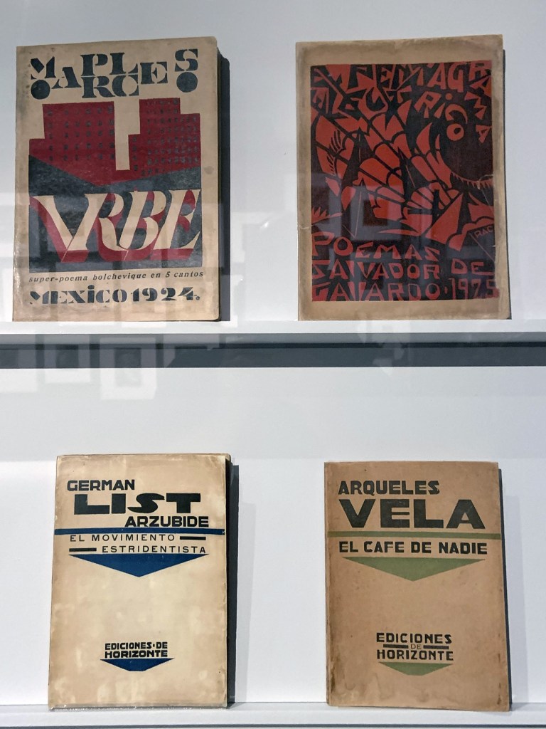 Installation view of the exhibition 'Into the Night: Cabarets and Clubs in Modern Art' at the Barbican Art Gallery, London showing Mexican printed books 1923-1927 Installation view of the exhibition 'Into the Night: Cabarets and Clubs in Modern Art' at the Barbican Art Gallery, London showing Mexican printed books 1923-1927