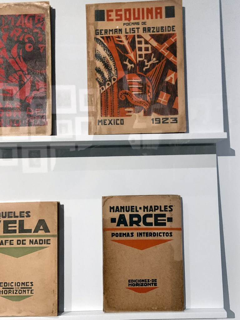 Installation view of the exhibition 'Into the Night: Cabarets and Clubs in Modern Art' at the Barbican Art Gallery, London showing Mexican printed books 1923-1927 Installation view of the exhibition 'Into the Night: Cabarets and Clubs in Modern Art' at the Barbican Art Gallery, London showing Mexican printed books 1923-1927