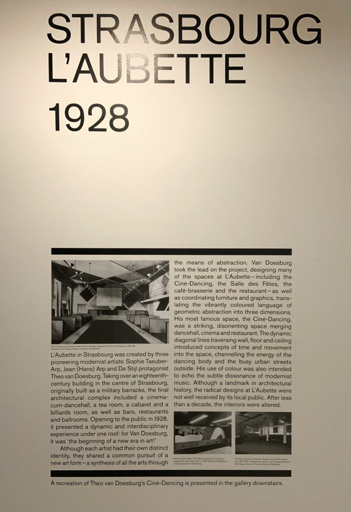 Strasbourg L'Aubette 1928 wall text Theo van Doesburg (Dutch, 1883-1931) 'The Ciné-bal (cinema-ballroom) at Café L'Aubette, Strasbourg, designed by Theo van Doesburg' 1926-1928 from the exhibition 'Into the Night: Cabarets and Clubs in Modern Art' at the Barbican Art Gallery, Oct 2019 - Jan 2020 Strasbourg L'Aubette 1928 wall text from the exhibition Theo van Doesburg (Dutch, 1883-1931) 'The Ciné-bal (cinema-ballroom) at Café L'Aubette, Strasbourg, designed by Theo van Doesburg' 1926-1928 from the exhibition 'Into the Night: Cabarets and Clubs in Modern Art' at the Barbican Art Gallery, Oct 2019 - Jan 2020