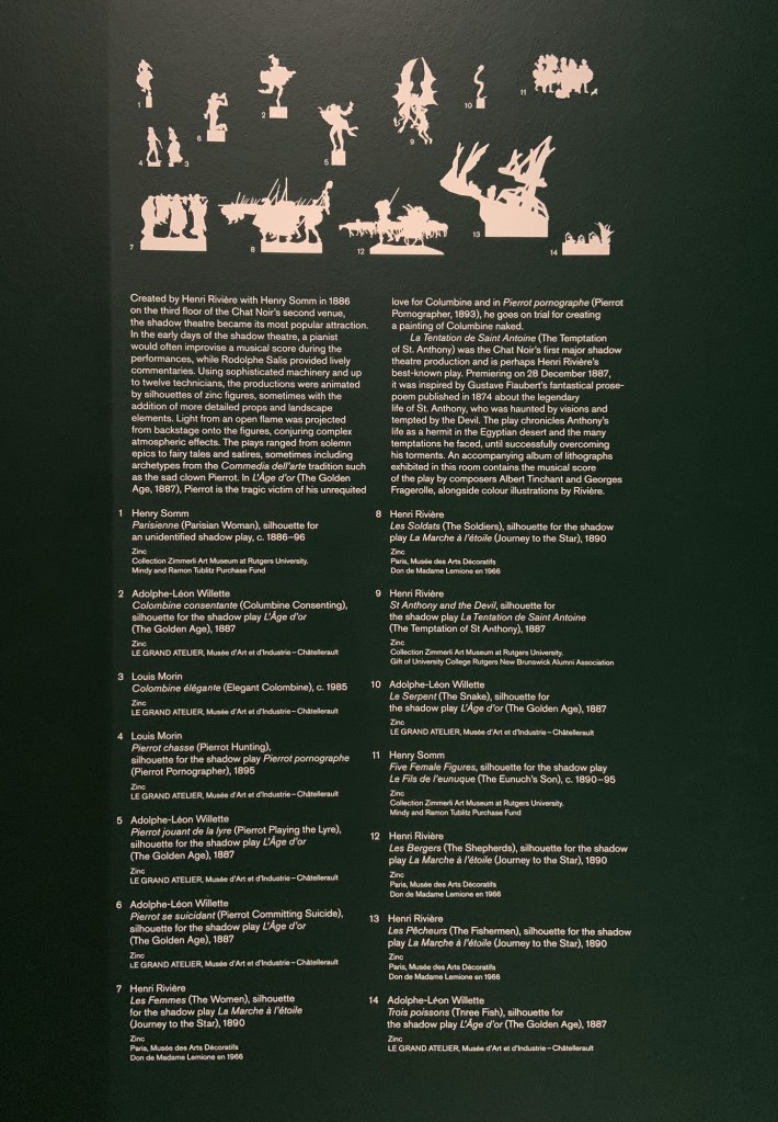 Installation view of the exhibition 'Into the Night: Cabarets and Clubs in Modern Art' at the Barbican Art Gallery, London showing Henri Rivière and Henry Somm's shadow theatre wall text Installation view of the exhibition 'Into the Night: Cabarets and Clubs in Modern Art' at the Barbican Art Gallery, London showing Henri Rivière and Henry Somm's shadow theatre wall text