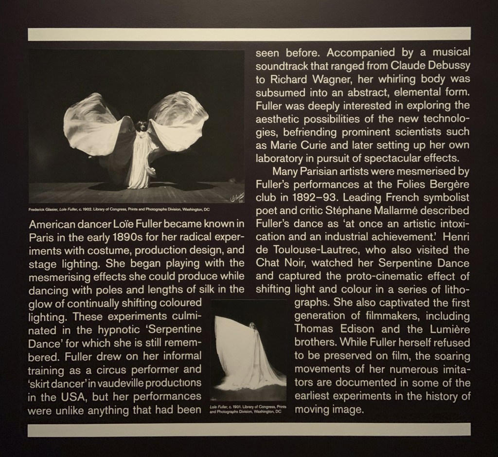 Paris: Loïe Fuller 1890s wall text from the exhibition 'Into the Night: Cabarets and Clubs in Modern Art' at the Barbican Art Gallery, Oct 2019 - Jan 2020 Paris: Loïe Fuller 1890s wall text from the exhibition 'Into the Night: Cabarets and Clubs in Modern Art' at the Barbican Art Gallery, Oct 2019 - Jan 2020
