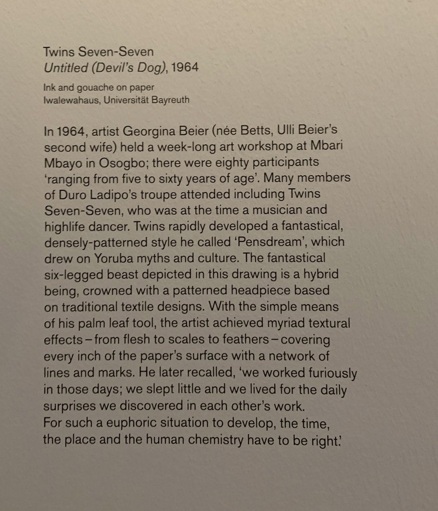 Twins Seven-Seven 'Devil's Dog' wall text from the exhibition 'Into the Night: Cabarets and Clubs in Modern Art' at the Barbican Art Gallery, Oct 2019 - Jan 2020 Twins Seven-Seven 'Devil's Dog' wall text from the exhibition 'Into the Night: Cabarets and Clubs in Modern Art' at the Barbican Art Gallery, Oct 2019 - Jan 2020