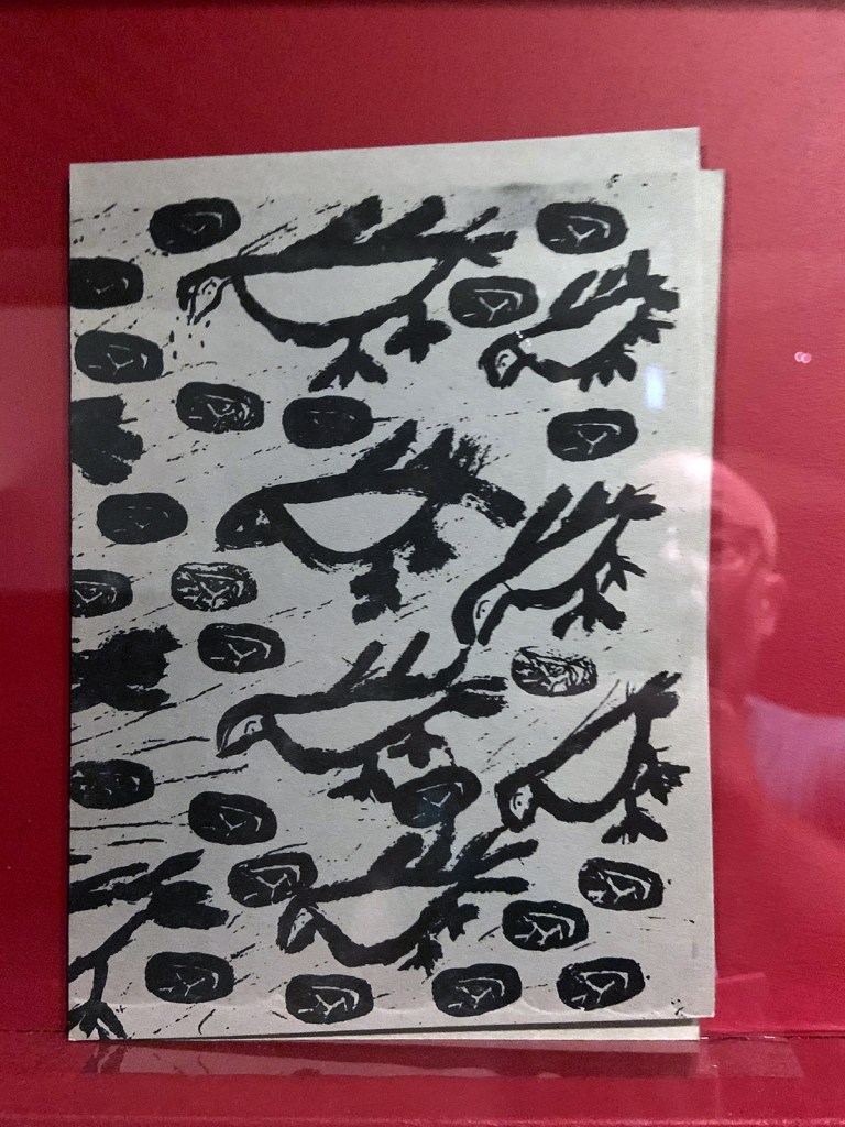 Installation view of the exhibition 'Into the Night: Cabarets and Clubs in Modern Art' at the Barbican Art Gallery showing some of the publishing output of the Mbari clubs Installation view of the exhibition 'Into the Night: Cabarets and Clubs in Modern Art' at the Barbican Art Gallery showing some of the publishing output of the Mbari clubs