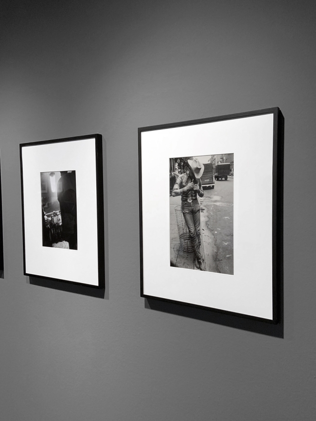 Installation view of the exhibition 'Robert Frank. Unseen' at C/O Berlin showing at left, 'Bar – Gallup, New Mexico' (1955) and at right, 'Rodeo – New York City' (1954)