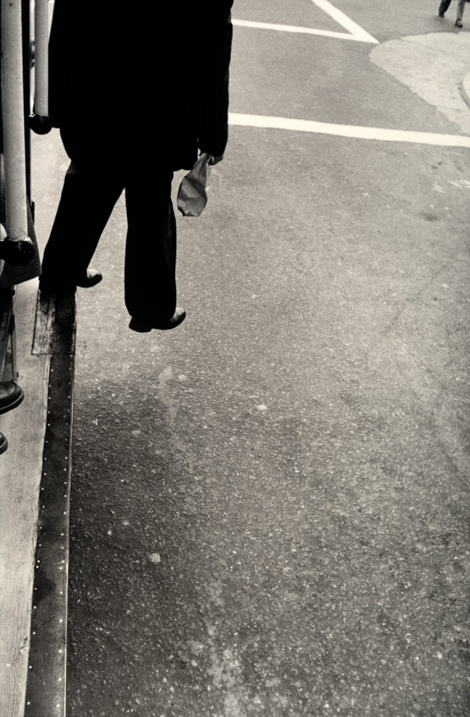Dorothea Lange (American, 1895-1965) 'Man Stepping from Cable Car, San Francisco' 1956