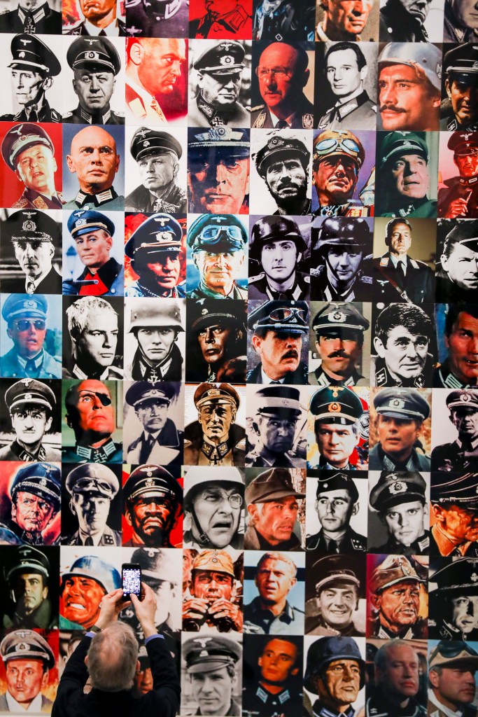 Installation view of 'Masculinities: Liberation through Photography' at Barbican Art Gallery on February 19, 2020 in London, England showing Piotr Uklanski's 'Untitled (The Nazis)' 1998, a collage of actors dressed as Nazis, courtesy of Massimo De Carlo Installation view of 'Masculinities: Liberation through Photography' at Barbican Art Gallery on February 19, 2020 in London, England showing Piotr Uklanski's 'Untitled (The Nazis)' 1998, a collage of actors dressed as Nazis, courtesy of Massimo De Carlo