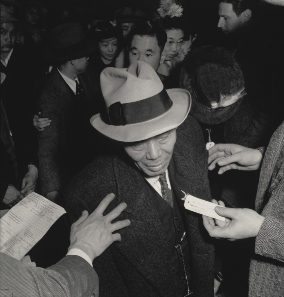 Dorothea Lange (American, 1895-1965) 'Just About to Step into the Bus for the Assembly Center, San Francisco' April 6, 1942, printed 1965