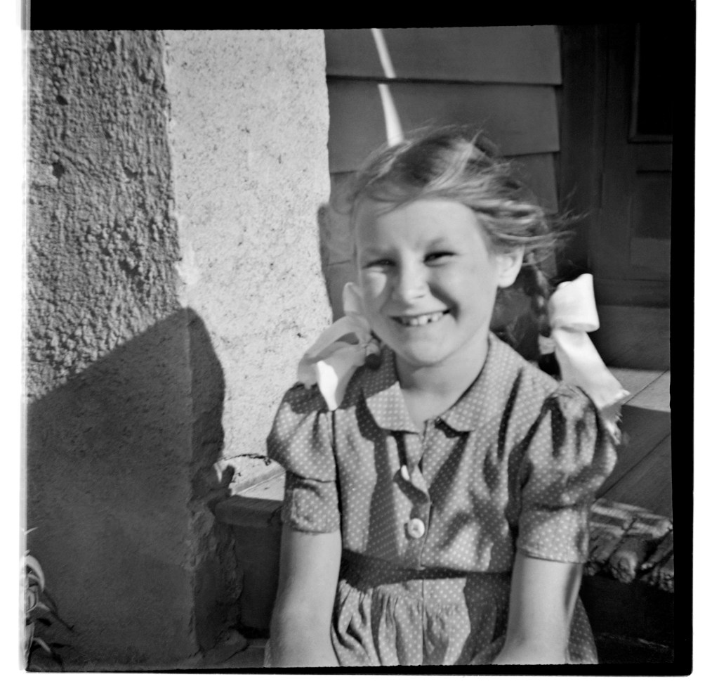 Unknown photographer (Australian) 'Untitled (Smiling girl with pigtails)' 1946-1947