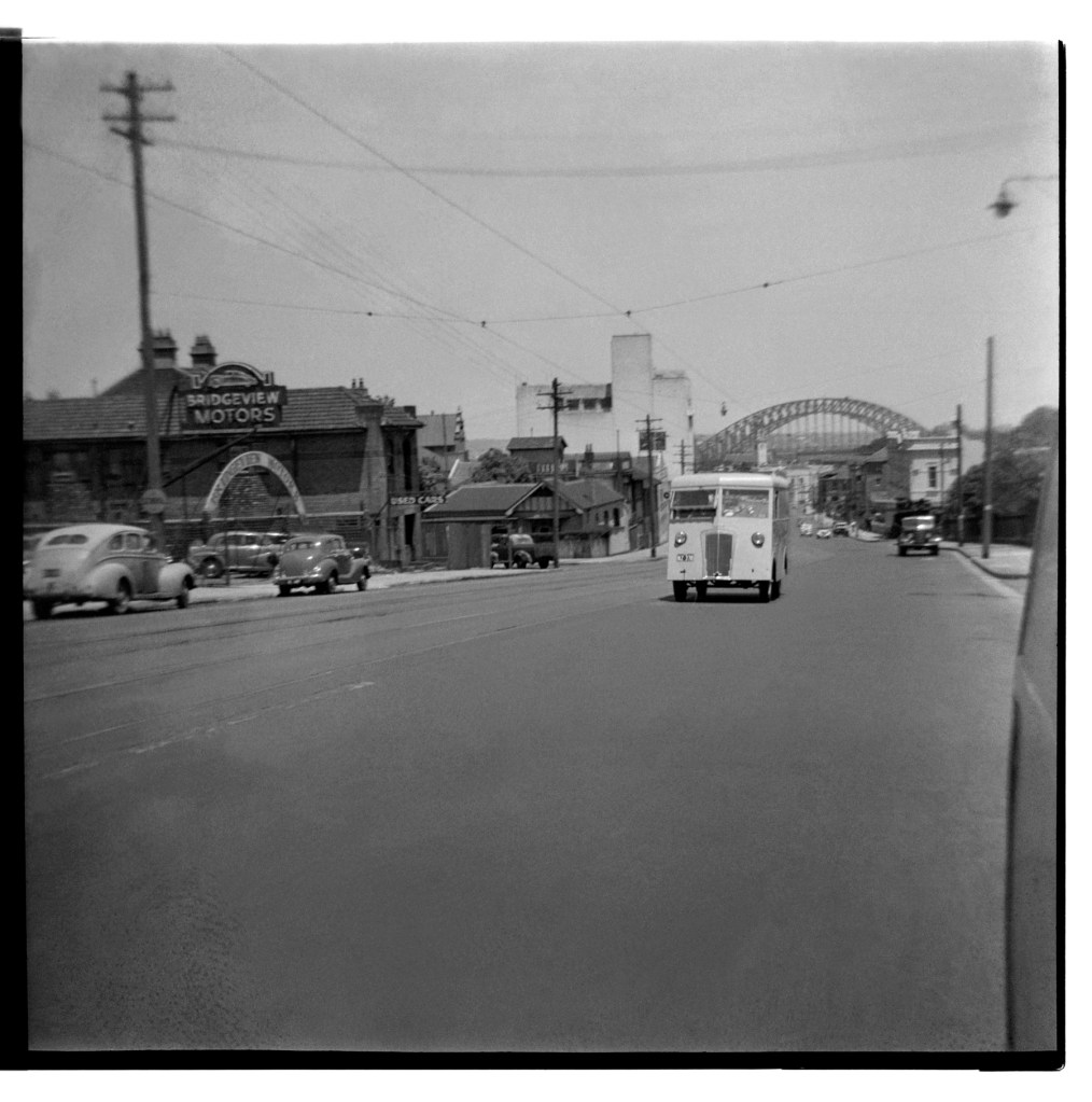 Unknown photographer (Australian) 'Untitled (Bridgeview Motors, 267 Pacific Highway, North Sydney with Sydney Harbour Bridge in the background)' 1946-1947