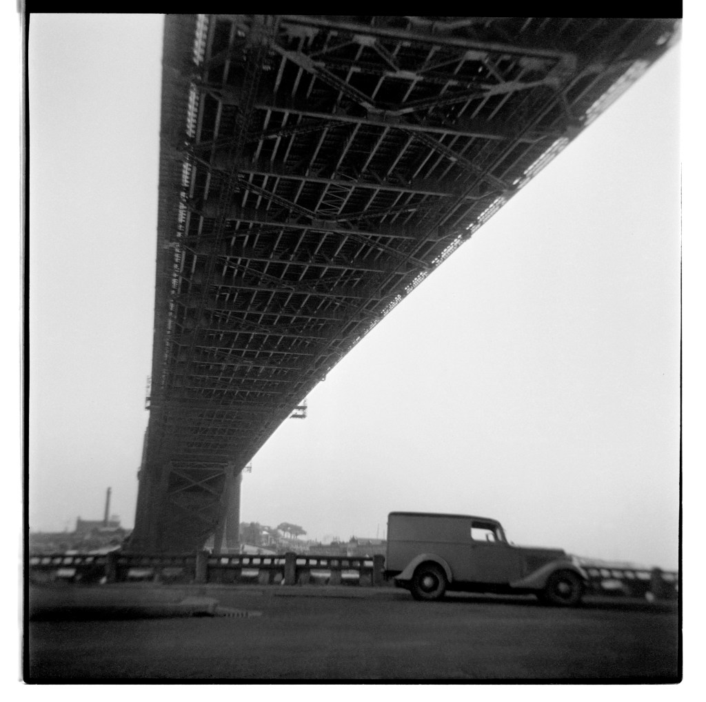 Unknown photographer (Australian) 'Untitled (Under the Sydney Harbour Bridge, north looking south showing DC current power station stack to the left)' 1946-1947
