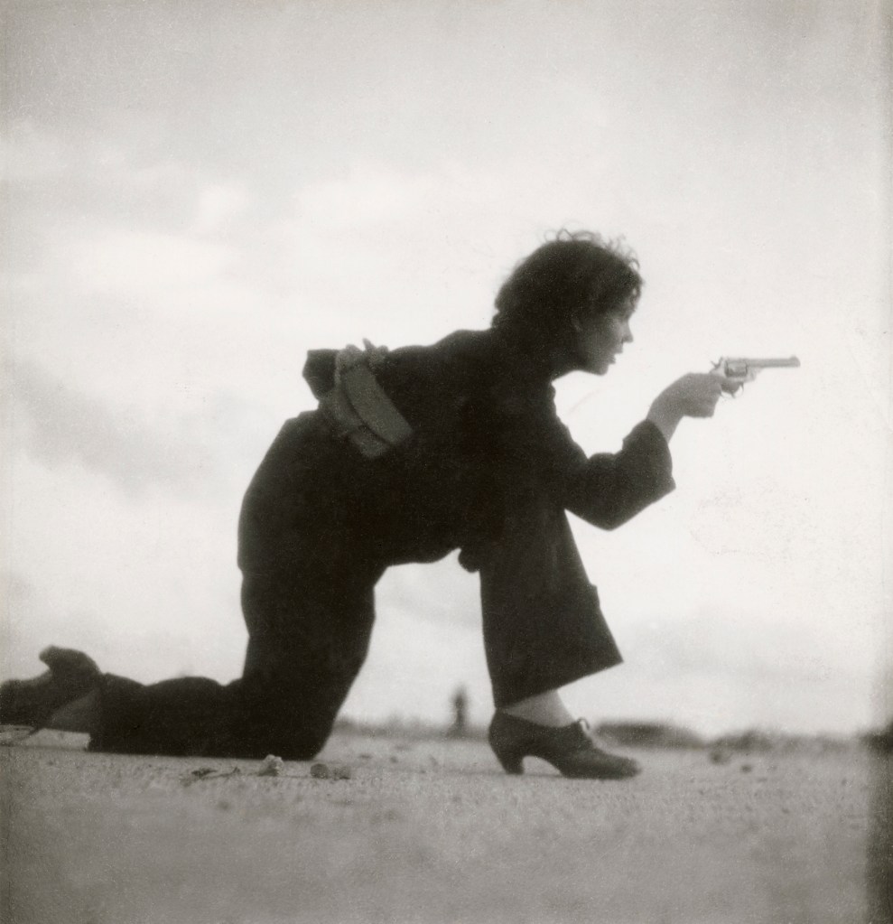 Gerda Taro (German, 1910-1937) 'Republican militiawoman training on the beach outside Barcelona, Spain' August 1936 from the exhibition 'Women War Photographers – From Lee Miller to Anja Niedringhaus' at the Fotomuseum Winterthur, Zurich, Feb - May, 2020