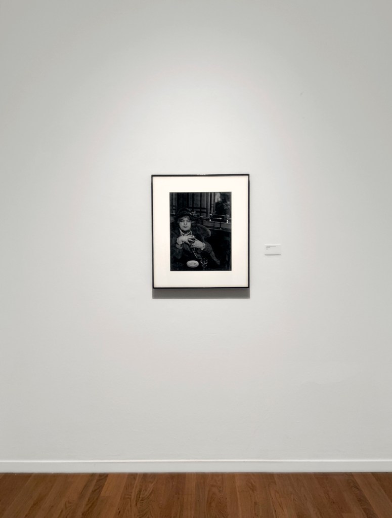 Installation view of the exhibition 'Brassaï' at Foam, Amsterdam showing a photograph from the section Personages, 'La Môme Bijou, Bar de la Lune, Montmartre' 1932