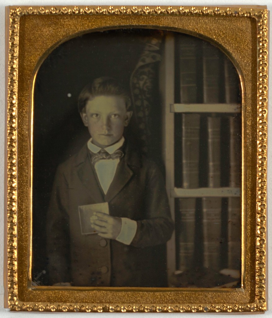 Unknown artist (American) '[Boy Holding a Daguerreotype]' 1850s