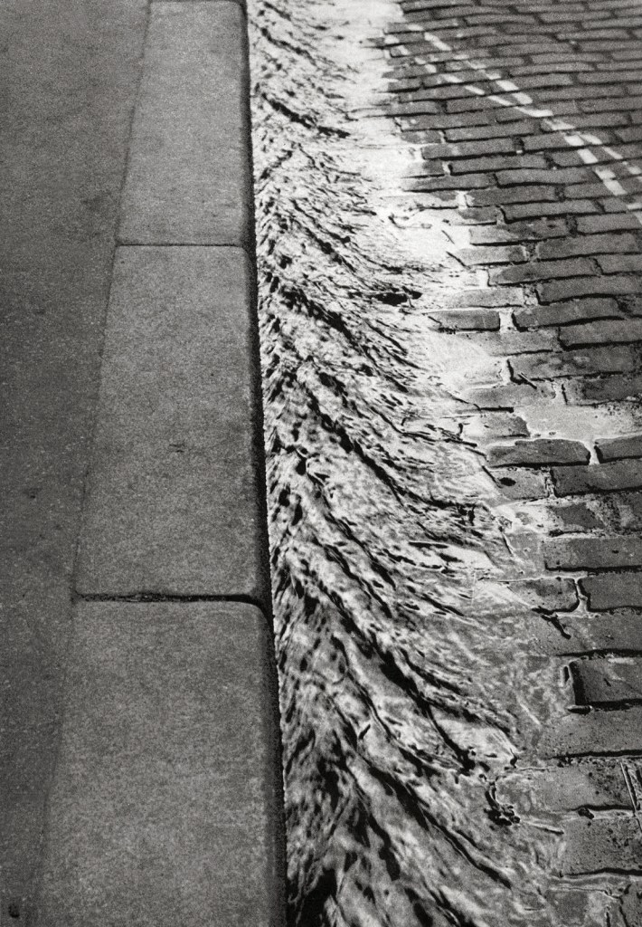André Kertész (Hungarian, 1894-1985) 'Trottoir, Paris' 'Sidewalk, Paris' 1929