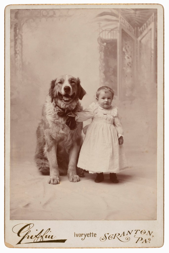 Charles L. Griffin, Scranton, PA. '[Toddler with dog]' c. 1892