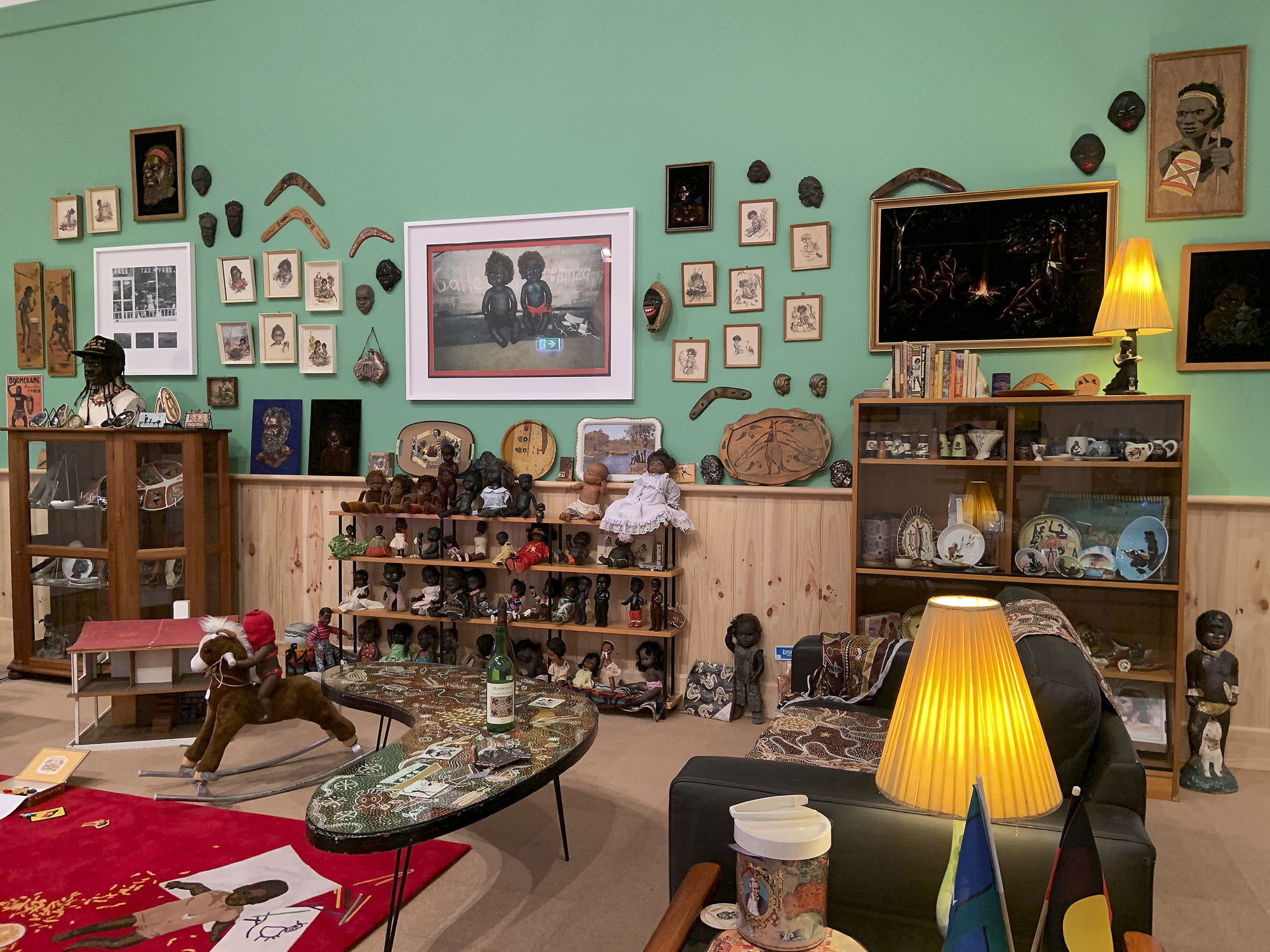 Installation view of 'DESTINY' at The Ian Potter Centre: NGV Australia, Melbourne, 2020 showing Destiny Deacon and Virginia Fraser's 'Koori lounge room' 2021 Installation view of 'DESTINY' at The Ian Potter Centre: NGV Australia, Melbourne, 2020 showing Destiny Deacon and Virginia Fraser's 'Koori lounge room' 2021