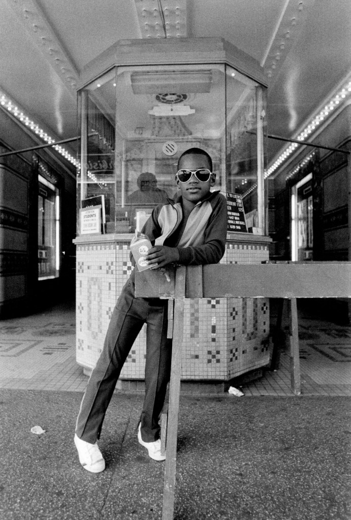 Dawoud Bey (American, b. 1953) 'A Boy in Front of the Loew's 125th Street Movie Theater, Harlem, NY, 1976' 1976 from the exhibition 'Dawoud Bey: An American Project' at the High Museum of Art, Atlanta, Nov 2020 - March 2021