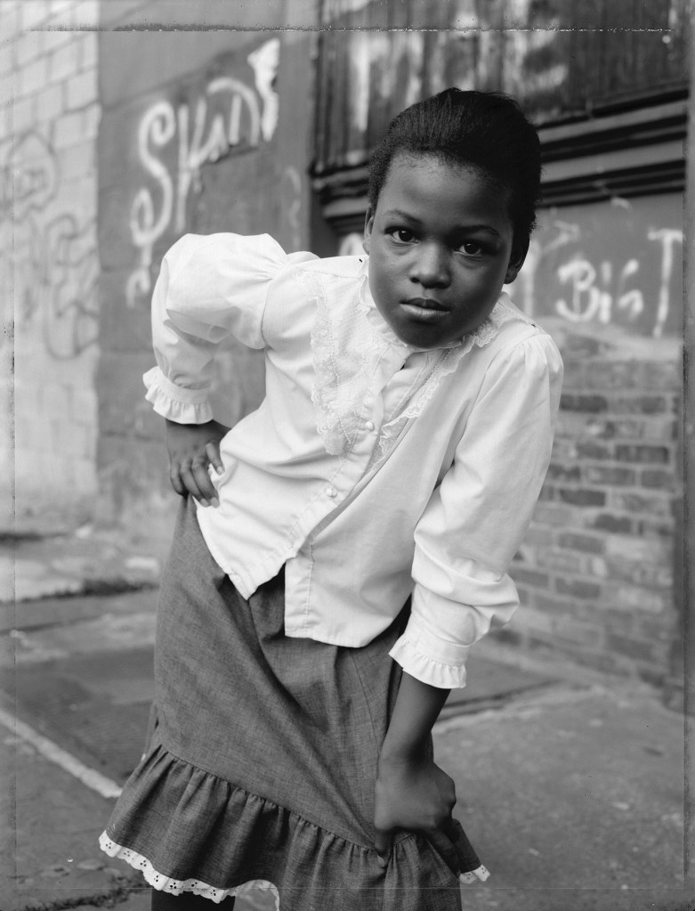 Dawoud Bey (American, b. 1953) 'A Young Girl Striking A Pose, Brooklyn, NY, 1988' 1988