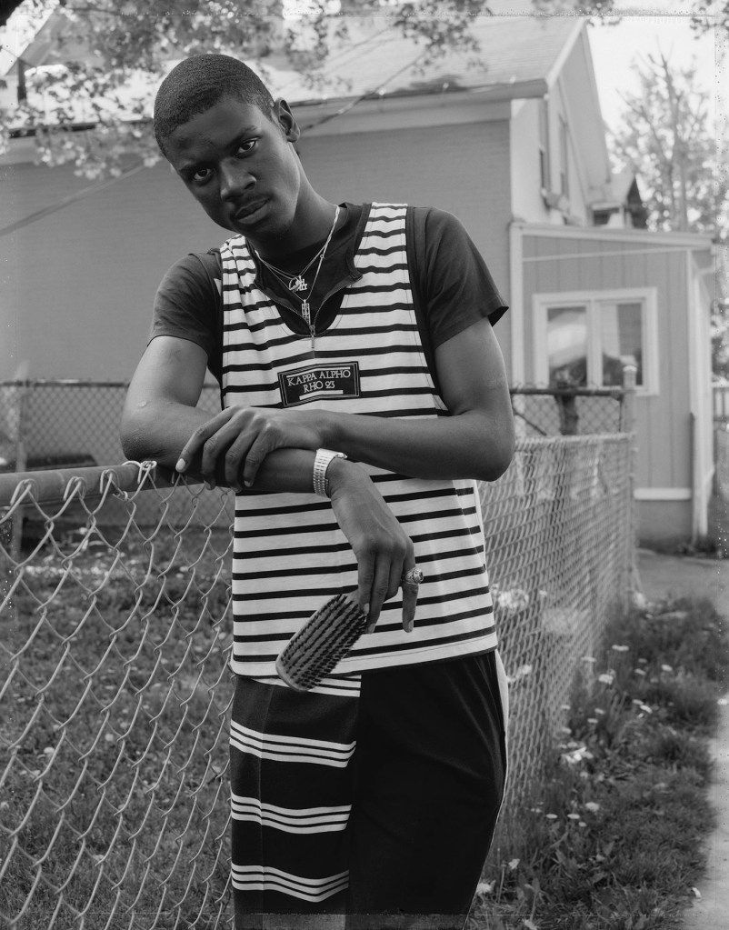Dawoud Bey (American, b. 1953) 'A Young Man with His Hair Brush, Rochester, NY 1989' 1989