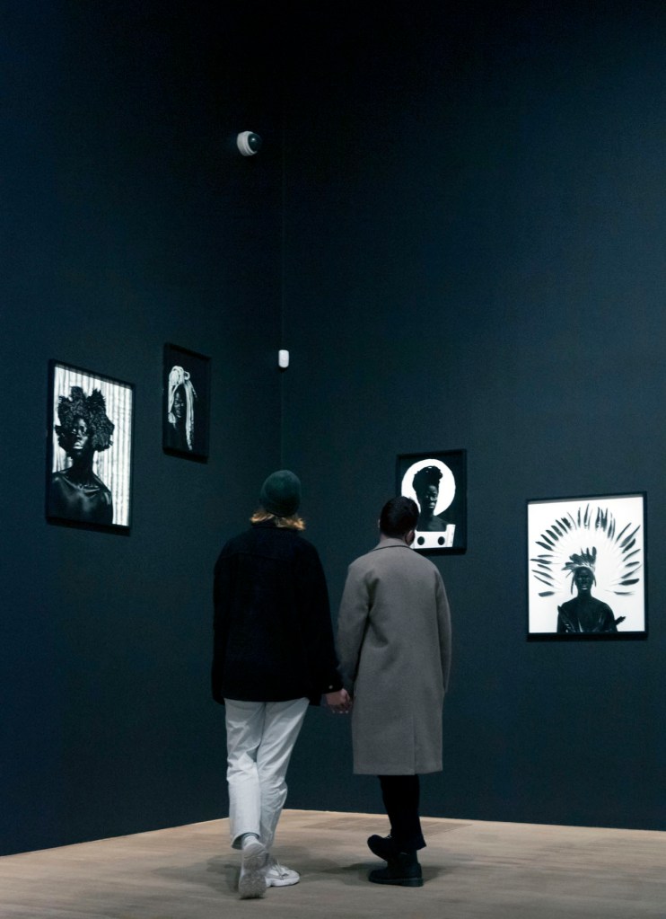 Installation photograph of Room 8 of the 'Zanele Muholi' exhibition, Tate Modern, November 2020 showing Muholi's series 'Somnyama Ngonyama: Hail the Dark Lioness'