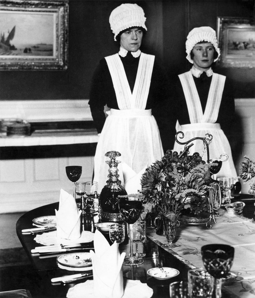 Bill Brandt (British born Germany, 1904-1983) 'Parlourmaid and Under-parlourmaid ready to serve dinner' 1936