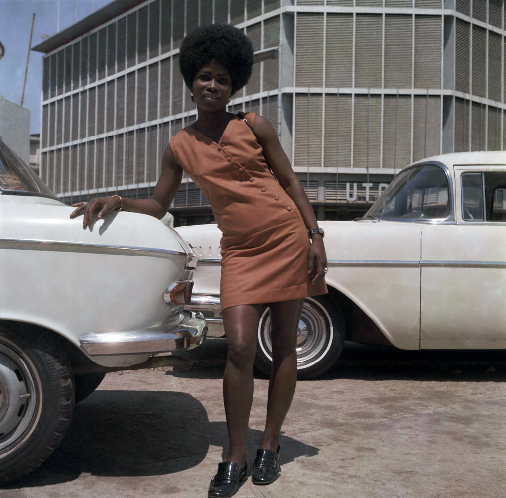 James Barnor (Ghanian, b. 1929) 'A store assistant on Station Road, Accra' 1971