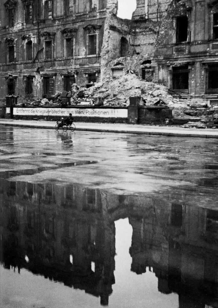Friedrich Seidenstücker (1882-1966) 'Ein rollstuhlfahrer passiert die ruine des stadtschlosses' (A wheelchair user passes the ruins of the city palace) 1947